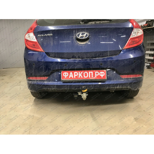 90910-A MOTODOR Фаркоп с оцинкованным шаром на Hyundai Solaris седан/хетчбек 2010-2017 (необходима подрезка бампера), Kia Rio III седан/хетчбек 2011-2017 (необходима подрезка бампера). Тип шара: A. Нагрузки 1200/75 кг, масса фаркопа 15,7 кг (без электрики