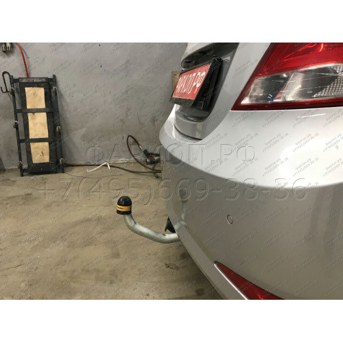 90910-A MOTODOR Фаркоп с оцинкованным шаром на Hyundai Solaris седан/хетчбек 2010-2017 (необходима подрезка бампера), Kia Rio III седан/хетчбек 2011-2017 (необходима подрезка бампера). Тип шара: A. Нагрузки 1200/75 кг, масса фаркопа 15,7 кг (без электрики