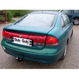 M015A GALIA Полностью оцинкованный фаркоп на Mazda 626 GE седан/хетчбек 1992-1997. Тип шара: A. Установка без снятия и выреза бампера. Нагрузки: 1700/75 кг, масс