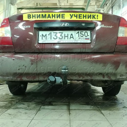 HY 01 AVTOS Фаркоп на Hyundai Accent седан 2000-2006 без подрезки бампера. Тип шара: A. Нагрузки: 1100/75 кг, масса фаркопа 12 кг (без электрики в комплекте)