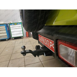 SZ 13 AVTOS Фаркоп на Suzuki Jimny 2018- без выреза в бампере. Тип шара: E. Нагрузки: 1200/75 кг, масса фаркопа 15 кг (без электрики в комплекте)