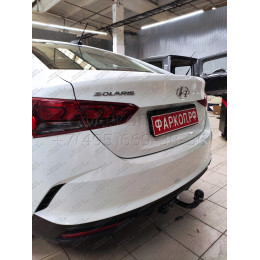 H228-A Лидер-плюс ТСУ для Hyundai Solaris 2 седан 2017-2022, Kia Rio 4 седан 2017-2020 без снятия и выреза бампера. Нагрузки: 1200/75 кг, масса фаркопа 14,1 кг (без электри