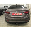 H228-A Лидер-плюс ТСУ для Hyundai Solaris 2 седан 2017-2022, Kia Rio 4 седан 2017-2020 без снятия и выреза бампера. Нагрузки: 1200/75 кг, масса фаркопа 14,1 кг (без электрики в комплекте)
