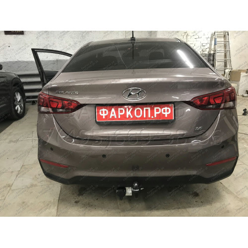 H228-A Лидер-плюс ТСУ для Hyundai Solaris 2 седан 2017-2022, Kia Rio 4 седан 2017-2020 без снятия и выреза бампера. Нагрузки: 1200/75 кг, масса фаркопа 14,1 кг (без электрики в комплекте)