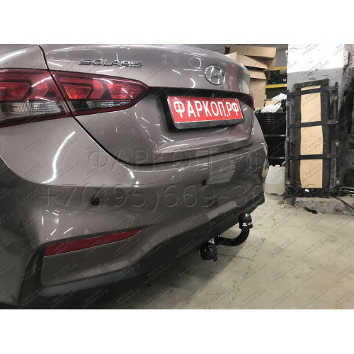H228-A Лидер-плюс ТСУ для Hyundai Solaris 2 седан 2017-2022, Kia Rio 4 седан 2017-2020 без снятия и выреза бампера. Нагрузки: 1200/75 кг, масса фаркопа 14,1 кг (без электрики в комплекте)