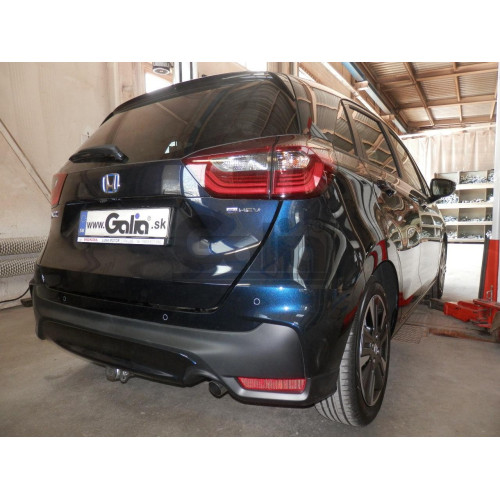 H115V GALIA Полностью оцинкованный фаркоп на Honda Jazz 2023-, Honda Jazz Crosstar 2023-. Подрозетник убирается за бампер. Тип шара: AV (вертикальное быстросъемное крепление шара на ключе). Невидимый вырез бампера. Нагрузки: 1200/75 кг, масса фаркопа 14,4