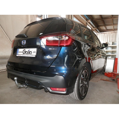 H115V GALIA Полностью оцинкованный фаркоп на Honda Jazz 2023-, Honda Jazz Crosstar 2023-. Подрозетник убирается за бампер. Тип шара: AV (вертикальное быстросъемное крепление шара на ключе). Невидимый вырез бампера. Нагрузки: 1200/75 кг, масса фаркопа 14,4