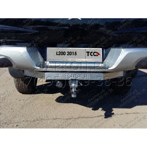 TCU00113 ТСС Фаркоп на Mitsubishi L200 2015-2019, 2019-2023 (с задним бампером) с накладкой с надписью Mitsubishi без подрезки бампера. Тип шара: E (шаровый узел под американский квадрат). Нагрузки: 2500/100 кг