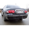 K025C GALIA Полностью оцинкованный фаркоп на Kia Opirus 2003-2010. Тип шара: C (горизонтальный съемный). Невидимый вырез бампера. Нагрузки: 2200/85 кг, масса фаркопа 19,36 кг