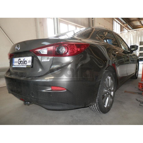 M135A GALIA Полностью оцинкованный фаркоп на Mazda 3 седан 2013-2019. Подрозетник убирается за бампер. Тип шара: A. Установка без выреза бампера. Нагрузки: 1800/90 кг, масса фаркопа 17,82 кг