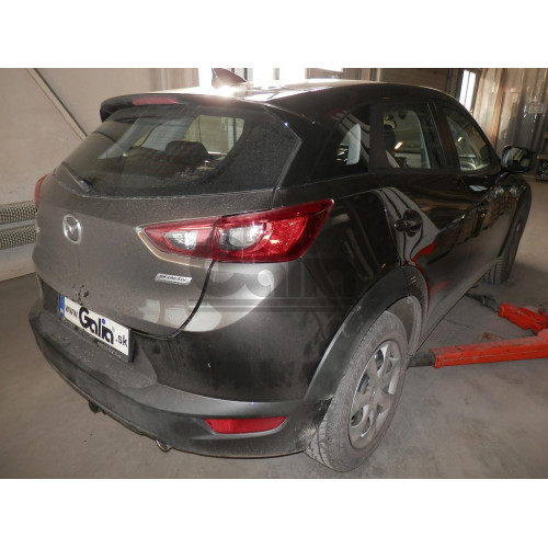 M137A GALIA Полностью оцинкованный фаркоп на Mazda CX-3 2015-. Подрозетник убирается за бампер. Тип шара: A. Невидимый вырез бампера. Нагрузки: 1800/80 кг, масса фаркопа 15,72 кг