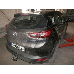 M137A GALIA Полностью оцинкованный фаркоп на Mazda CX-3 2015-. Подрозетник убирается за бампер. Тип шара: A. Невидимый вырез бампера. Нагрузки: 1800/80 кг, ма