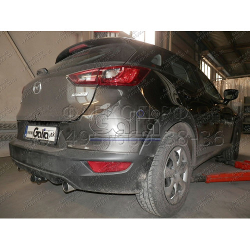 M137A GALIA Полностью оцинкованный фаркоп на Mazda CX-3 2015-. Подрозетник убирается за бампер. Тип шара: A. Невидимый вырез бампера. Нагрузки: 1800/80 кг, масса фаркопа 15,72 кг