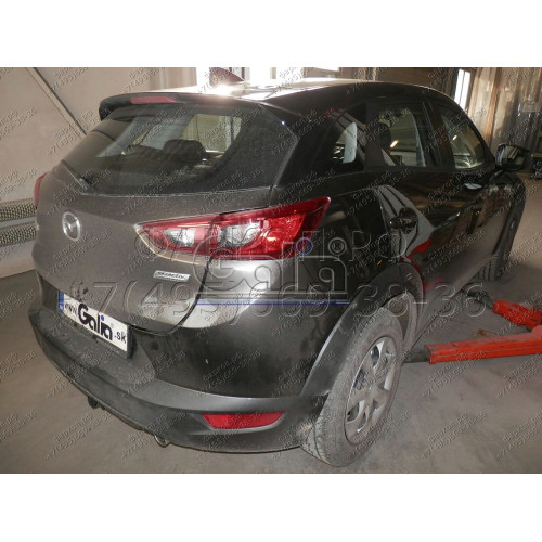 M137A GALIA Полностью оцинкованный фаркоп на Mazda CX-3 2015-. Подрозетник убирается за бампер. Тип шара: A. Невидимый вырез бампера. Нагрузки: 1800/80 кг, масса фаркопа 15,72 кг