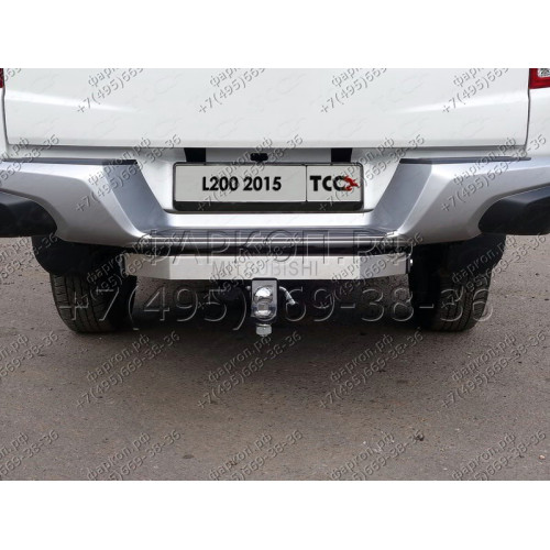 TCU00091 ТСС Фаркоп на Mitsubishi L200 2015-2019, 2019-2023 (с задним бампером) с накладкой с надписью Mitsubishi без подрезки бампера. Тип шара: E (шаровый узел под американский квадрат). Нагрузки: 1800/100 кг
