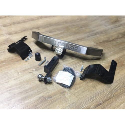 TCU00049 ТСС Фаркоп на Toyota Land Cruiser 200 2007-2021 с накладкой с надписью Land Cruiser без подрезки бампера. Тип шара: E (шаровый узел под американский квадрат). Нагрузки: 1500/100 кг