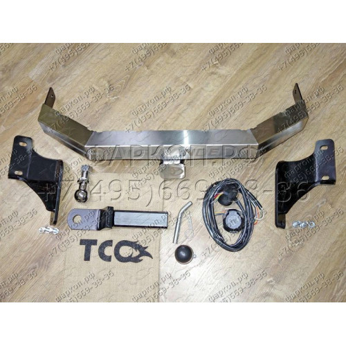 TCU00060 ТСС Фаркоп на Toyota Highlander 2014-2020 с накладкой с надписью Highlander без подрезки бампера. Тип шара: E (шаровый узел под американский квадрат). Нагрузки: 1500/100 кг